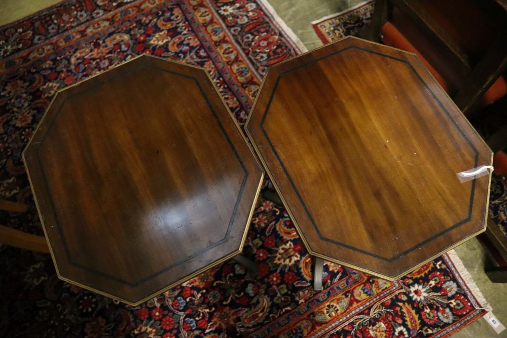 A pair of Regency design octagonal mahogany tripod wine tables, width 45cm, depth 39cm, height 75cm